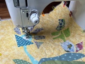 Quilt unter der Nähmaschine