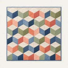 Kleine Patchworkdecke: Gequilteter Wandbehang im Tumbling Blocks Patchworkmuster